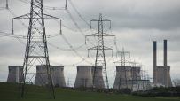 A general view shows pylons and Ferrybridge C power station, owned by energy company SSE, which is set to stop generating and close in March 2016, near Knottingley, northern England, on May 24, 2015. The coal-fired powerstation went online in 1966. AFP PHOTO / OLI SCARFF (Photo credit should read OLI SCARFF/AFP/Getty Images)