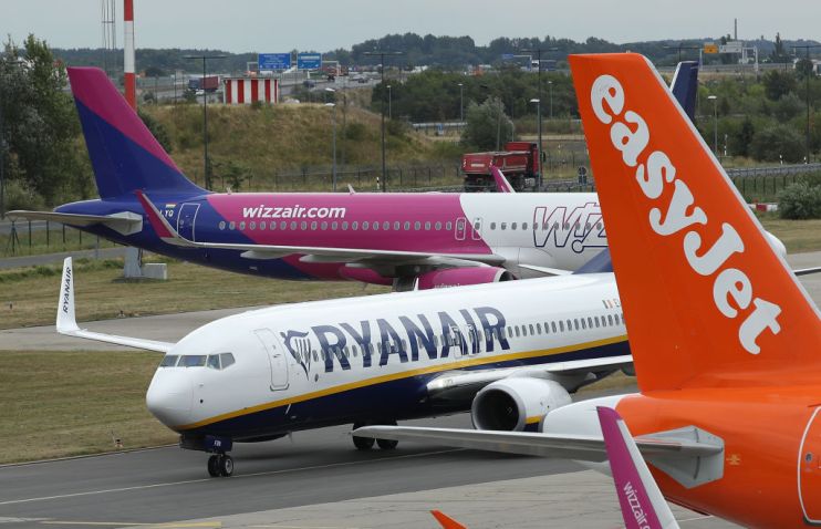 Three of Europe's biggest budget airlines have hit out at new draft EU proposals to exempt long-haul airlines from rules that would require them to monitor their non-CO2 emissions.