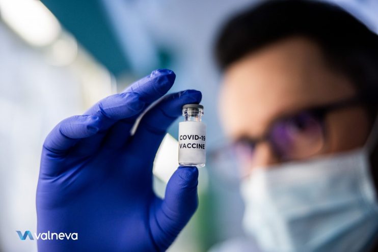 Valneva scientist holds Covid vaccine