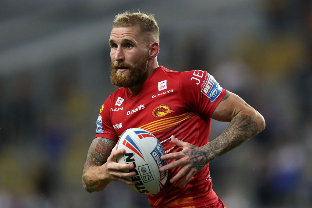 Sam Tomkins of Catalans Dragons carries has backed his former club Wigan Warriors in their Challenge Cup final with Huddersfield Giants at Tottenham's Premier League table.
