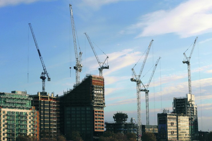 Ashtead: Cranes alongside several skyscrapers