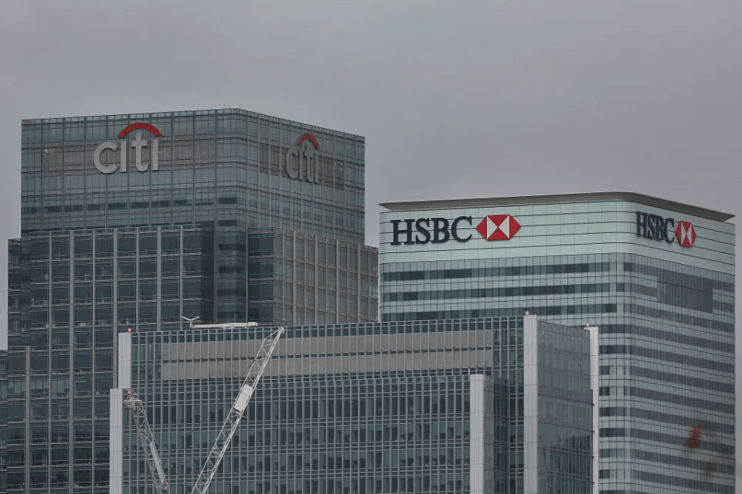 FTSE 100 lenders were in the red as markers opened.