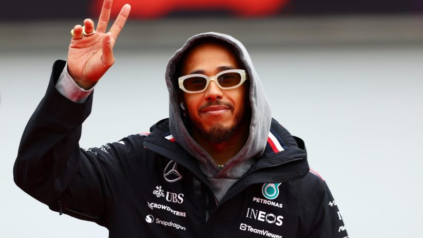 Multiple F1 champion Lewis Hamilton indicating his preference for the two-finger KitKat. Possibly