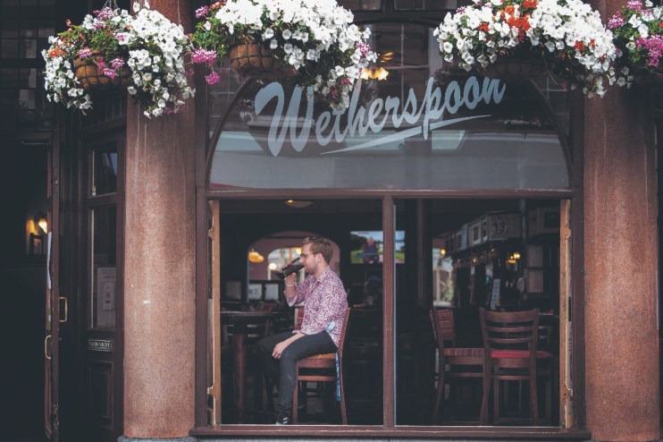 Wetherspoons pub interior, highlighting budget atmosphere amid minimum wage debate by founder Sir Tim Martin