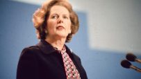 Margaret Thatcher smiling outside 10 Downing Street during her tenure as UKs longest-serving Prime Minister in the 20th ce...