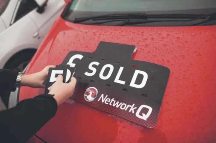 Car sold on sale forecourt, highlighting successful transaction in automotive market, emphasizing vehicle purchase trends