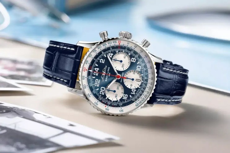 Breitling luxury watch with stainless steel case, black dial, and leather strap showcasing precision craftsmanship