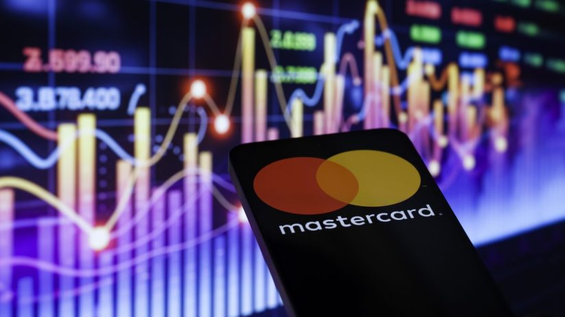 Mastercard logo prominently displayed on a sleek office building, symbolizing global financial services and innovation.