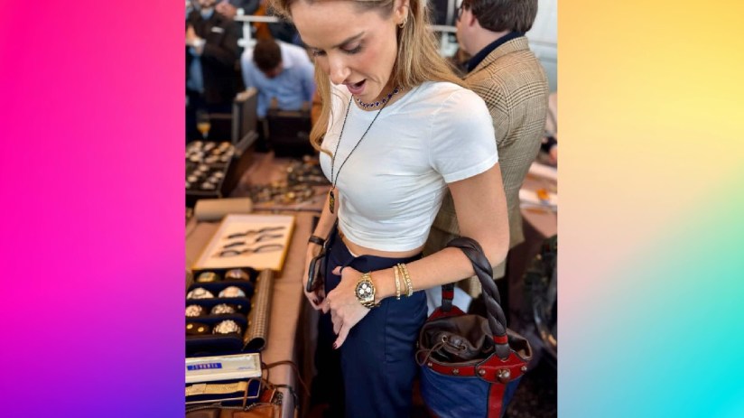 Watch collectors discussing vintage timepieces at a gathering, showcasing various luxury watches in a professional setting.
