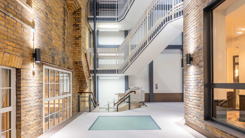 Premier Inn London Farringdon Old Bailey lobby designed by Chris Dalton, showcasing modern decor and welcoming atmosphere