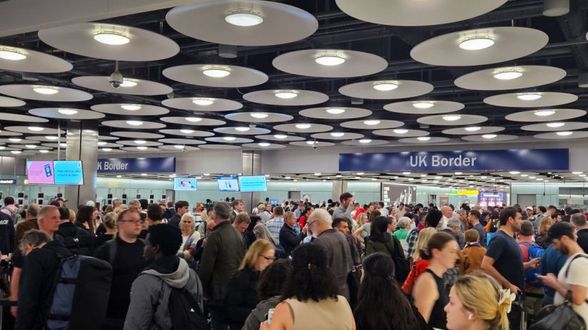 Heathrow Airport bustling with travelers and airplanes on the tarmac, highlighting its role as a major international hub
