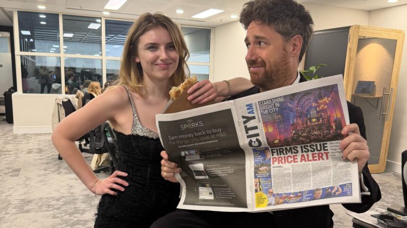 Anna and Adam receiving recognition at the Guildhall CityAM Awards ceremony, celebrating excellence in business leadership.