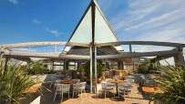 London rooftop bar with scenic views, located in Soho near Covent Garden, featuring stylish seating and vibrant city backdrop