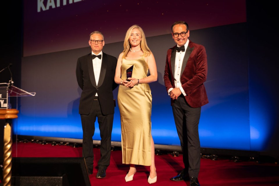 Kathleen Brooks accepting an award at CityAM Awards ceremony, celebrating achievements in the business sector.