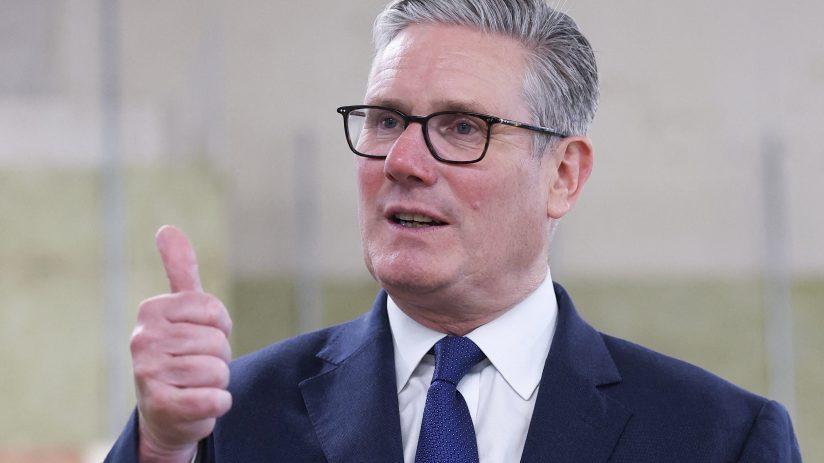 Keir Starmer stands firmly addressing media, emphasizing his decision not to resign amidst political challenges.