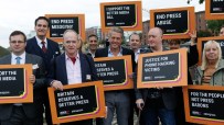 Hugh Grant expressing frustration, advocating for press regulation, amidst concerns over free speech and Downing Street po...