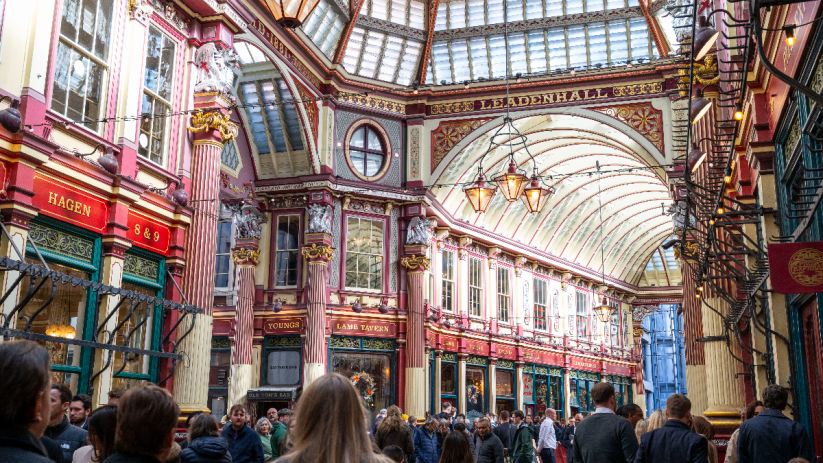 Leadenhall Market vibrant during City Square Mile festival with bustling crowds and colorful decorations