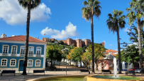 Scenic view of Algarves stunning coastline with golden beaches and clear blue waters, perfect for Portugal holiday escapes