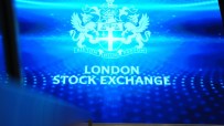 London Stock Exchange market activity with traders and financial charts, capturing economic trends and trading dynamics