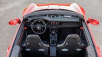Sleek Porsche 911 GT3 showcased in dynamic urban setting, highlighting its performance features and modern design