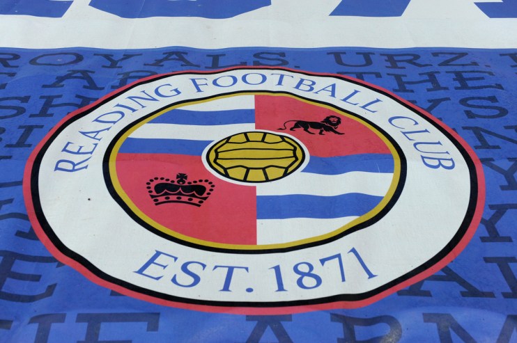 Reading Football Club crest on a blue and white banner, with EST. 1871 visible.